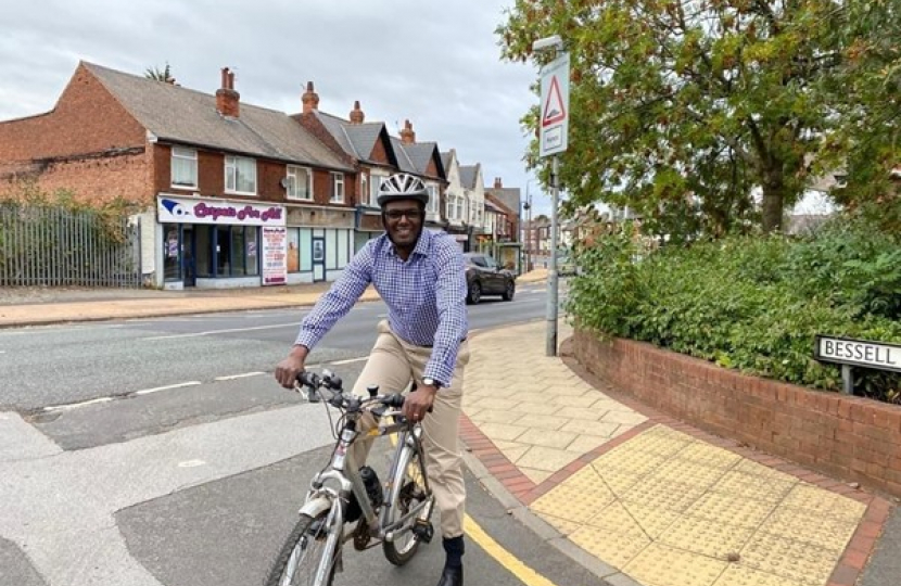 Darren Henry MP on a Bike